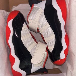 Jordan Black and Red Sneakers Iconic Basketball Style